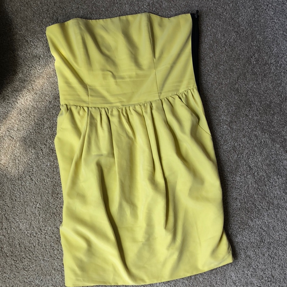 Women’s yellow strapless dress